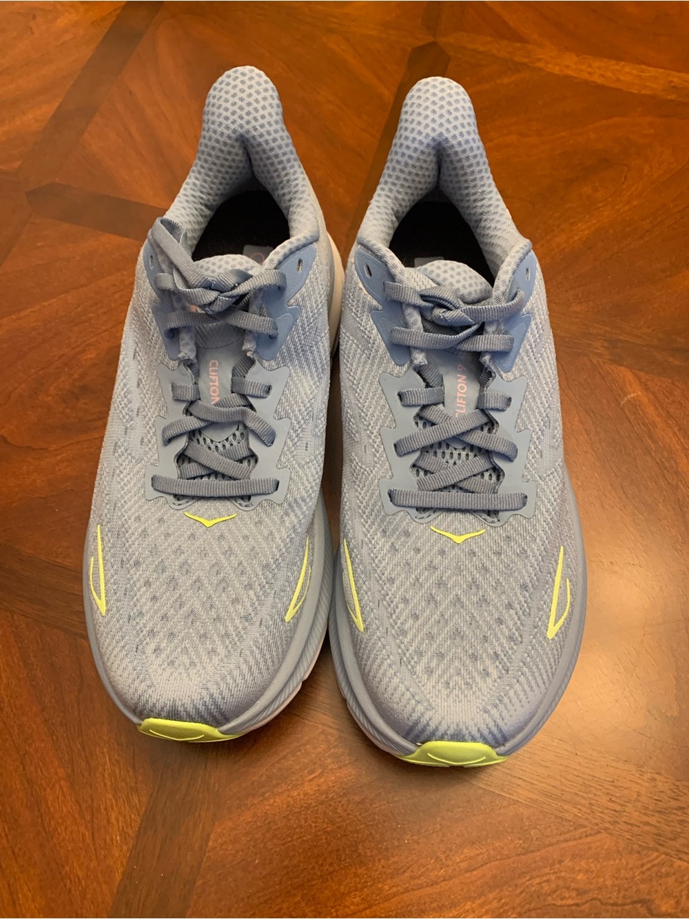 NWOB HOKA Clifton 9 Light Blue Running Sneakers with Lime Accents. Size 8.5B